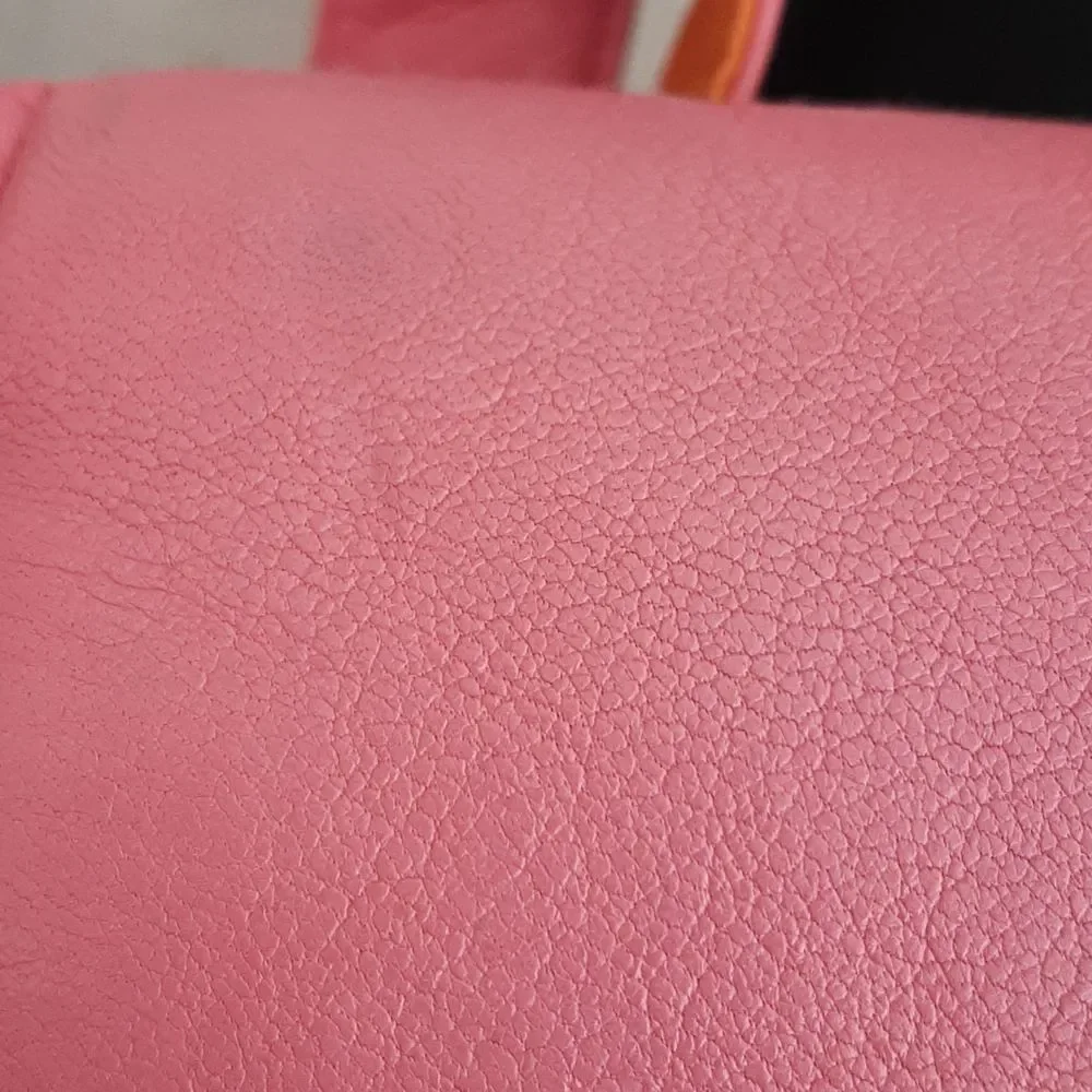 Pink and orange leathershoulder handbag